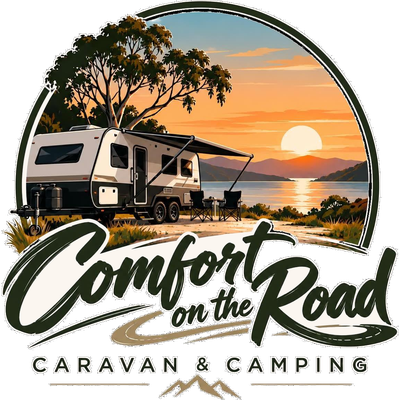 Comfort on the Road – caravan under a gum tree at sunset by the water
